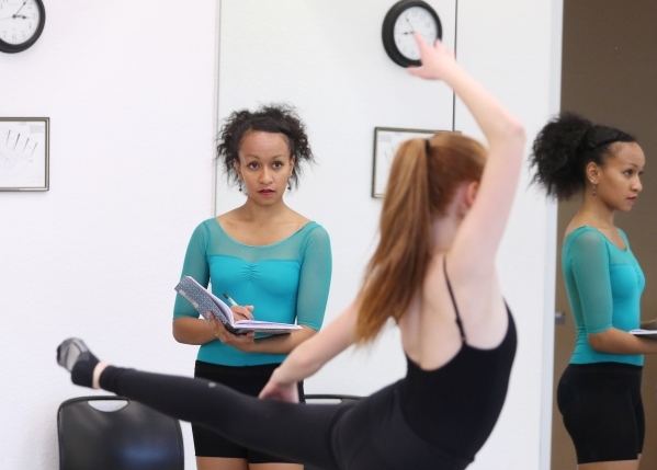 Choreographer Ariel Triunfo, left, watches dancers including Erin Waldeck, 14, perform during a rehearsal of Triunfo‘s piece for the annual A Choreographers‘ Showcase at Nevada Ballet  ...