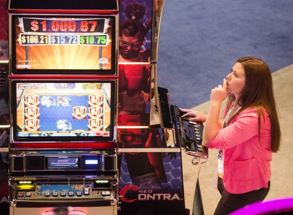 Stephanie Ostrander plays Neo Contra game by Konami during the Global Gaming Expo at the  Sands Expo and Convention Center on Tuesday, Sept. 29,2015. (Jeff Scheid/ Las Vegas Review-Journal Follow  ...
