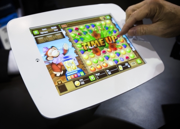 A bar-top tablet skill-based game is demonstrated at the Gamblit Gaming booth at the Global Gaming Expo in the Sands Expo and Convention Center on Wednesday, Sept. 30, 2015. (Jeff Scheid/ Las Vega ...