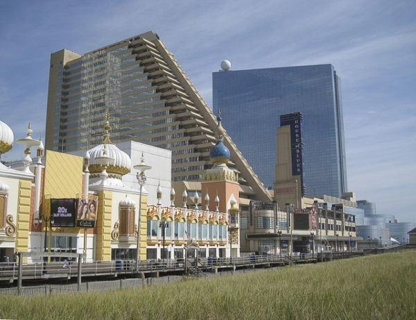 The north end of the Atlantic City Boardwalk is seen on Sept. 11, 2014. The Trump Taj Mahal, left, filed for bankruptcy on Sept. 9. The Showboat, center, closed on Aug. 31, 2014.  Revel, right, cl ...