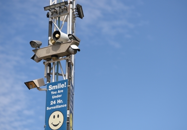 A portable tower of surveillance equipment towers over the home of Rick Van Thiel on Thursday, Oct. 8, 2015, in Las Vegas where he allegedly performed medical procedures including abortions and ca ...