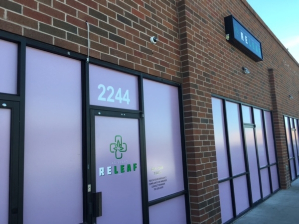 Officials have asked medical marijuana dispensary Las Vegas ReLeaf to remove the sign from its door, because such promotions are not allowed. COURTESY of Jason Sturtsman