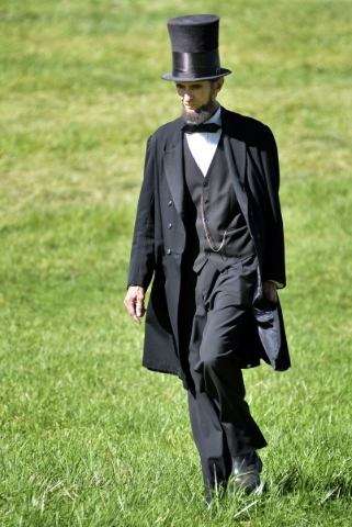 Robert Broski, as Abraham Lincoln, walks across a field after a battle at Spring Mountain Ranch State Park on Saturday, Oct. 24, 2015. (Bill Hughes/Las Vegas Review-Journal)