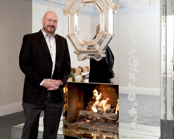 Businessman Martyn Ravenhill stands in front of a mirrored fireplace in the master suite of the Liberace‘s old Las Vegas home, which he purchased for $500,000 in 2013.
Tonya Harvey/Real Es ...