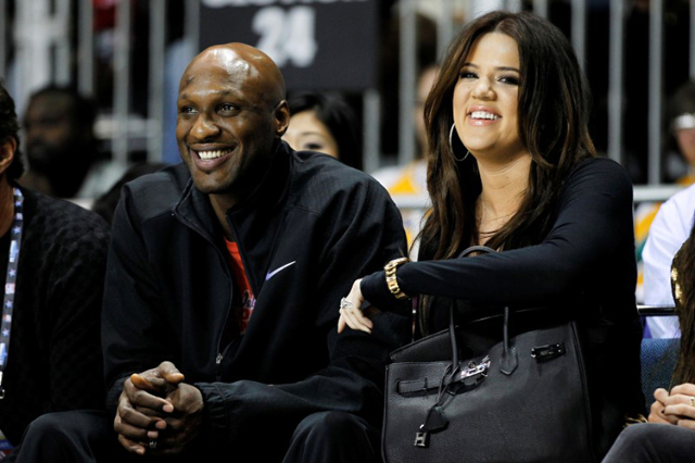 Los Angeles Lakers‘ Lamar Odom and his wife television personality Khloe Kardashian sit courtside as they attend the 2011 BBVA All-Star Celebrity basketball game as a part of the NBA All-Sta ...