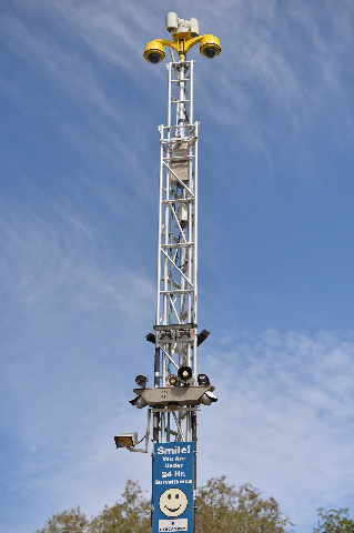 A portable tower of surveillance equipment towers over the home of Rick Van Thiel on Thursday, Oct. 8, 2015 in Las Vegas, where he allegedly performed medical procedures like abortions and cancer  ...