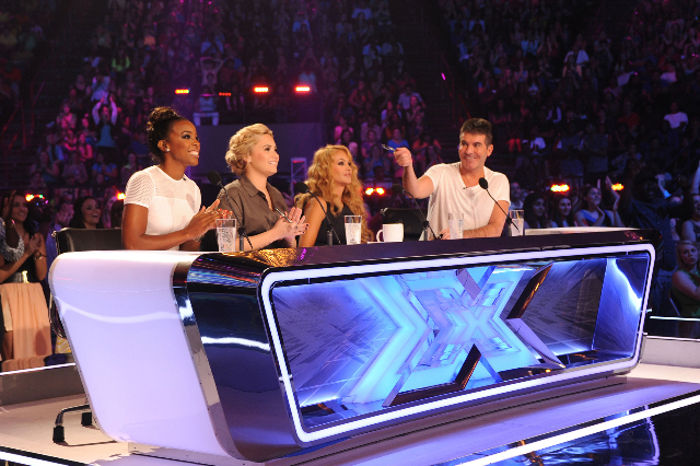 Obsessed Simon Cowell fan surprises judges with her tattoo 