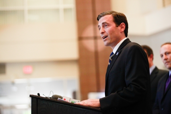 Nevada Attorney General Adam Laxalt speaks with news media at the Sawyer Building in Las Vegas on Tuesday, April 28, 2015.  (Chase Stevens/Las Vegas Review-Journal)