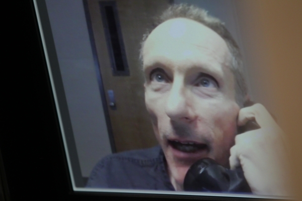 Rick Van Thiel, booked at Clark County Detention Center for charges including acting as a medical practitioner without a license, and possessing a gun by a prohibited person, speaks during an inte ...