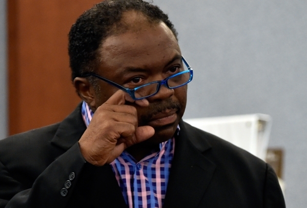 Tehran Boldon, younger brother  of murder victim Michael Bolden, wipes his eye as he gives his testimony during Ammar Harris‘s penalty hearing at the Regional Justice Center on Monday, Nov.  ...