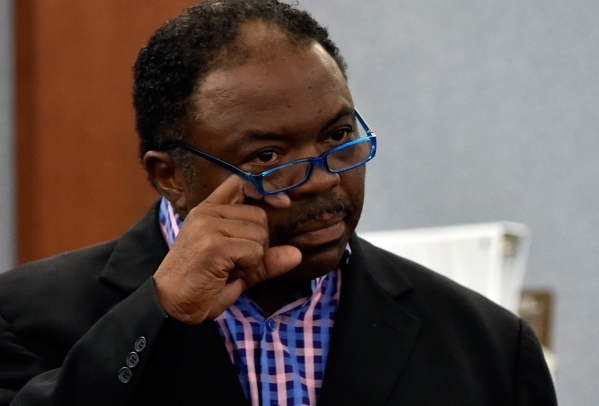 Tehran Boldon, younger brother of murder victim Michael Bolden, wipes his eye as he gives his testimony during Ammar Harris‘s penalty hearing at the Regional Justice Center on Monday, Nov. ...