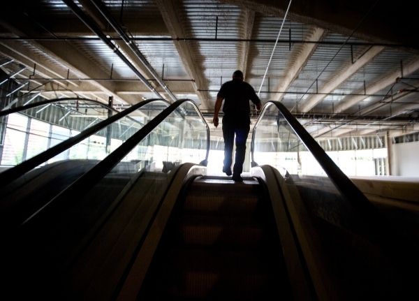 A Treasure Island employee walks up escalators at  the site of of the proposed Marvel Comics store on Tuesday, Nov. 10, 2015. The Treasure Island announced that  Marvel Comics will open a two stor ...