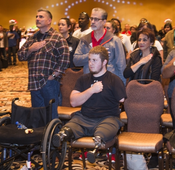 Wounded Warrior Kevin Trimble and other guest  during Presentation of the Colors at the "Salute the Troops" event at the The Mirage on Friday, Nov. 13, 2015. MGM Resorts International is ...