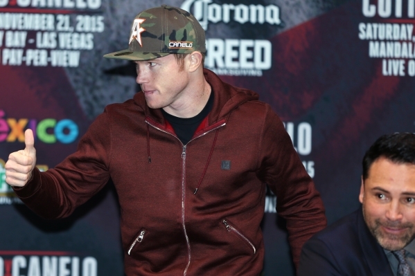 Saul "Canelo" Alvarez gives a thumbs up during the final press conference before his fight against Miguel Cotto at Mandalay Bay casino-hotel in Las Vegas Wednesday, Nov. 18, 2015. Erik V ...