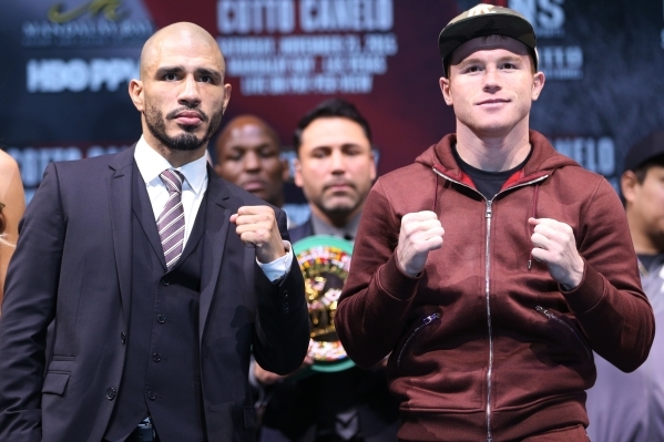 Miguel Cotto, left, and Canelo Alvarez pose during the final press conference at Mandalay Bay casino-hotel in Las Vegas Wednesday, Nob. 18, 2015. Canelo and Cotto will fight Saturday for the World ...