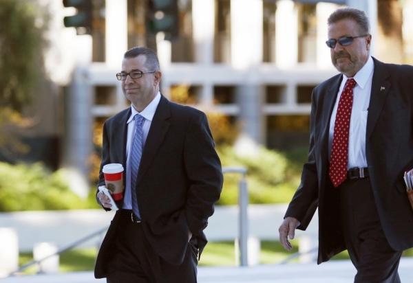 Ralph Priola, left, arrives with his attorney John Moran Jr. at Lloyd George U.S. Courthouse Tuesday, Nov. 17, 2015, in Las Vegas. Priola appeared at federal court for sentencing with his involvem ...