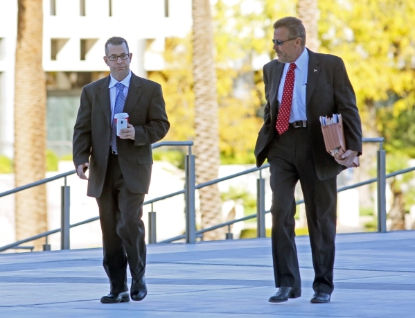 Ralph Priola, left, arrives with his attorney John Moran Jr. at Lloyd George U.S. Courthouse Tuesday, Nov. 17, 2015, in Las Vegas. Priola appeared at federal court for sentencing with his involvem ...