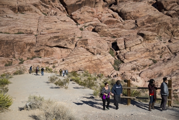 People enjoy scenery inside the scenic loop of the Red Rock Canyon National Conservation Area on Monday, Nov. 16 2015. Red Rock is celebrating its 25th anniversary as a national conservation area. ...