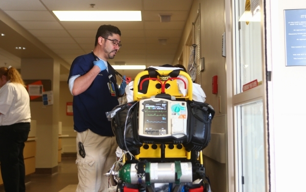 ER physician Christopher Nevarez talks with a patient who just arrived at the emergency room at Southern Hills Medical Center in Las Vegas on Tuesday, Nov. 17, 2015. Chase Stevens/Las Vegas Review ...
