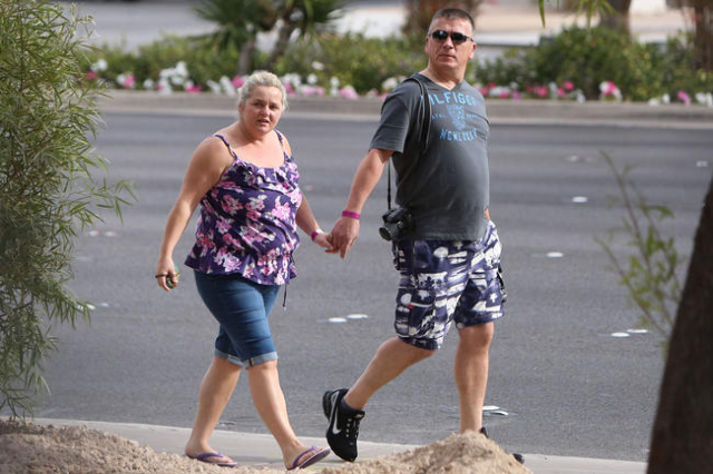 Tourists wearing shorts walk during a warm morning along Las Vegas Boulevard near the Mandalay Bay hotel-casino on Monday, Nov. 23, 2015. Bizuayehu Tesfaye/Las Vegas Review-Journal Follow @bizute ...