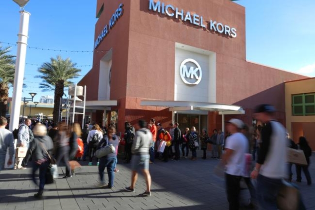A line forms to enter the Michael Kors store on Black at Las Vegas North  Premium Outlets on Friday, November 27, 2015, in Las Vegas. Brett Le Blanc/Las  Vegas Review-Journal Follow @bleblancphoto |