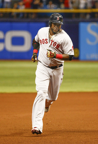 Sep 12, 2015; St. Petersburg, FL, USA; Boston Red Sox designated hitter David Ortiz (34) rounds third base after he hits his 500th home run during the fifth inning of a baseball game against the T ...