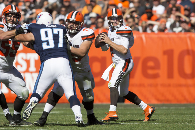 Sep 20, 2015; Cleveland, OH, USA;  Cleveland Browns quarterback Johnny Manziel (2) looks downfield for an open receiver against the Tennessee Titans in the third quarter at FirstEnergy Stadium. Th ...