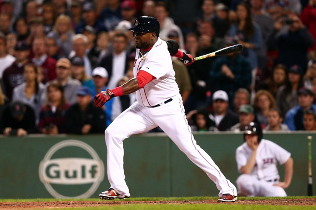 Sep 21, 2015; Boston, MA, USA; Boston Red Sox designated hitter David Ortiz (34) knocks in a run against the Tampa Bay Rays during the seventh inning at Fenway Park. (Mark L. Baer/USA Today Sports)