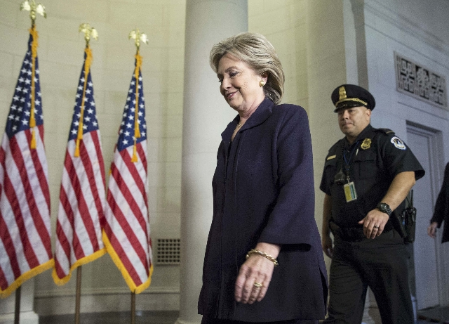 U.S. Democratic presidential candidate Hillary Clinton arrives to testify before the House Select Committee on Benghazi on Capitol Hill in Washington October 22, 2015. The congressional committee ...