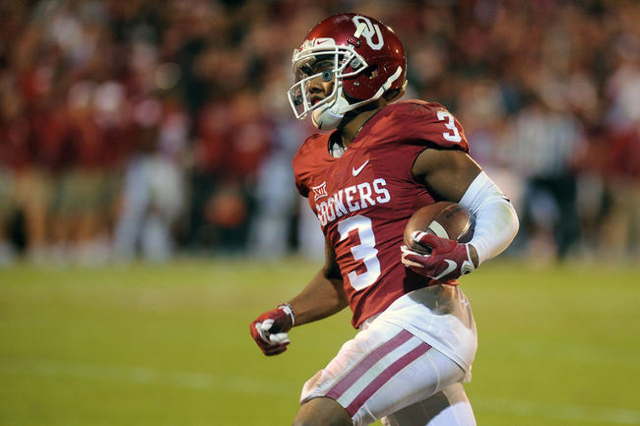 Nov 7, 2015; Norman, OK, USA; Oklahoma Sooners wide receiver Sterling Shepard (3) runs after a catch against the Iowa State Cyclones during the fourth quarter at Gaylord Family - Oklahoma Memorial ...