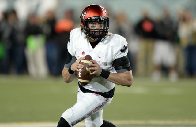 UNLV Rebels quarterback Blake Decker (5) scrambles with the football in the second quarter against the Colorado State Rams at Sonny Lubick Field at Hughes Stadium. Mandatory Credit: Ron Chenoy-USA ...