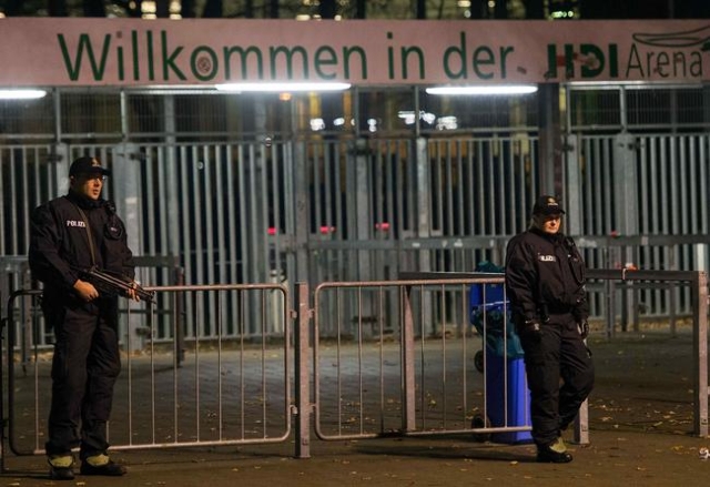 Football Soccer - Germany vs Netherlands - International Friendly - HDI Arena, Hanover, Germany - 17/11/15. Heavy armed police patrol in front of the stadium after the match was called off by poli ...