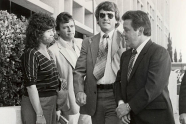 Mobster Anthony Spilitro, right, does the perp walk in 1983 following his racketeering arrest. He is accompanied, right to left, by FBI agent Mark Kaspar, while journalists George Knapp and Jane A ...