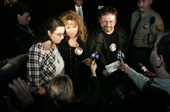 Family members of murder victim Betty Jane May answer media questions outside Nevada State Prison in Carson City, Nev., on Wednesday night, April 26, 2006, following the execution of her killer, D ...