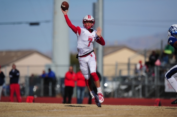 Liberty quarterback Kenyon Oblad passes on a two-point conversion in the second half of the NIAA Division 1 Sunrise Region Football Final prep football game against Basic at Basic High School in H ...