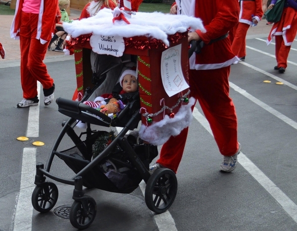 A baby is pushed during the 2012 Great Santa Run. Ginger Meurer/Special to View