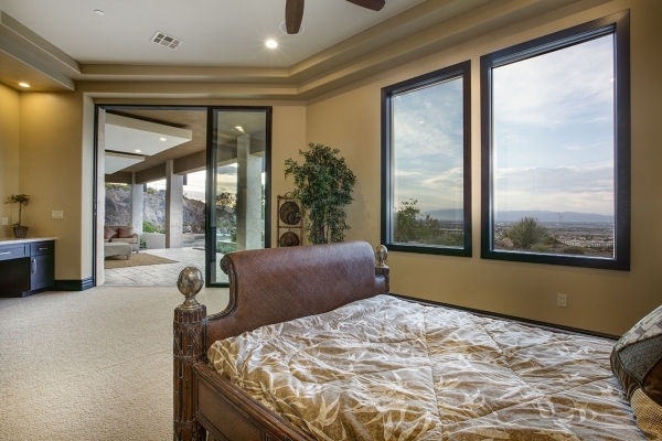 Several of the bedrooms open to the second-story balcony. COURTESY