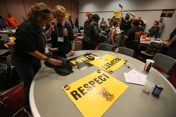 Supporters gather their things after listening to Larry Griffith, the Secretary-Treasurer of Teamsters Local 14, speak at the Cashman Center after a vote that ousted the ESEA in favor of Teamsters ...