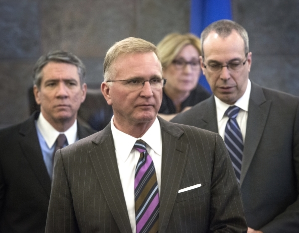 Defense attorney Daniel Polsenberg, left, plaintiffs attorney Robert Eglet and David Wall as seen after a sidebar with Judge Kerry Earley during a multibillion dollar lawsuit against Takeda Pharma ...