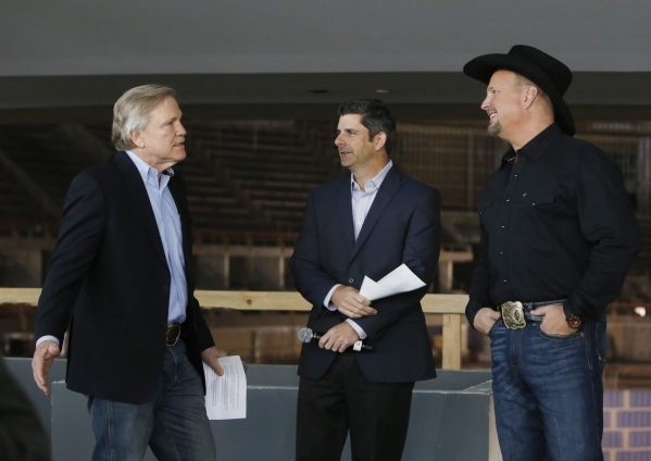 Artist Garth Brooks, right, Pat Christenson, president of Las Vegas Events, left, and Rick Arpin, senior vice president of MGM Resorts International‘s data strategy and arena operations, cen ...