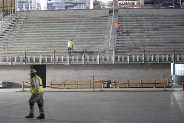 Workers work at the site of the new Las Vegas MGM-AEG Arena on Thursday, Dec. 3, 2015. Bizuayehu Tesfaye/Las Vegas Review-Journal Follow @bizutesfaye