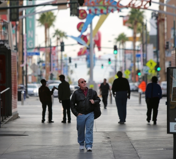 A man walks enters the Fremont Street Experience on December 3, 2015, in Las Vegas. Brett Le Blanc/Las Vegas Review-Journal Follow @bleblancphoto