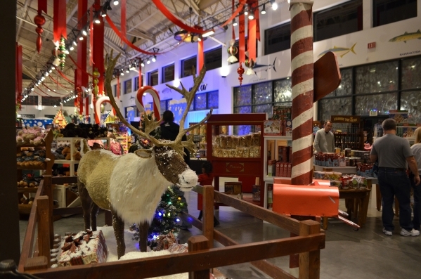 A giant talking reindeer welcomes visitors to Bass Pro Shops‘ Winter Wonderland. Ginger Meurer/Special to View
