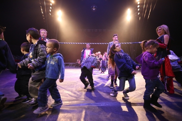 Children do the limbo during the pre-show for the opening night of Circus Vargas at the Meadows Mall parking lot in Las Vegas Thursday, Dec. 11, 2015. Rachel Aston/Las Vegas Review-Journal Follow@ ...