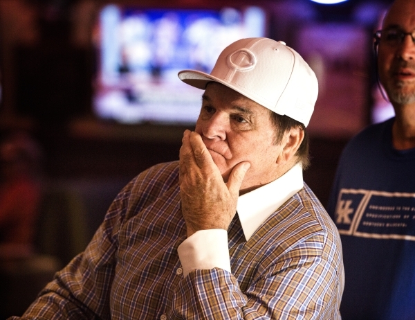 A dejected Major League Baseball all-time hits leader Pete Rose  watches MLB Network inside Pete Rose Sports Bar and Grill, 3743 S Las Vegas Boulevard, after he conducted  a press conference on Tu ...
