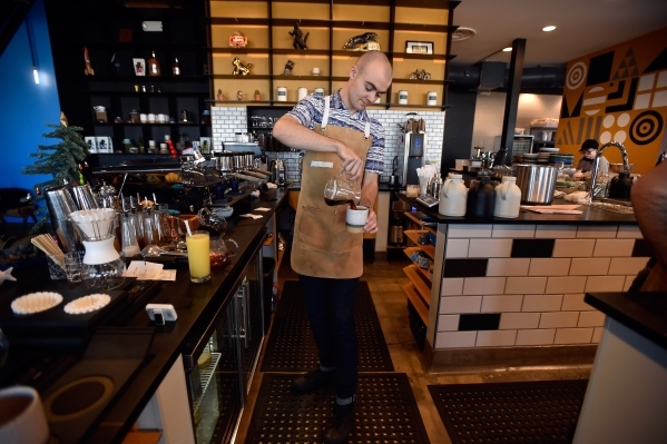 Caleb Eggleston prepares customers‘ beverages at PublicUs on Monday, Dec. 28, 2015, in Las Vegas. The downtown eatery features a wide variety of hot and chilled drinks. David Becker/Las Vega ...