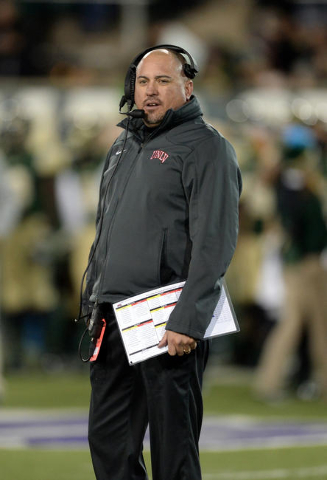 UNLV Rebels coach Tony Sanchez in the second quarter against the Colorado State Rams at Sonny Lubick Field at Hughes Stadium. Mandatory Credit: Ron Chenoy-USA TODAY Sports