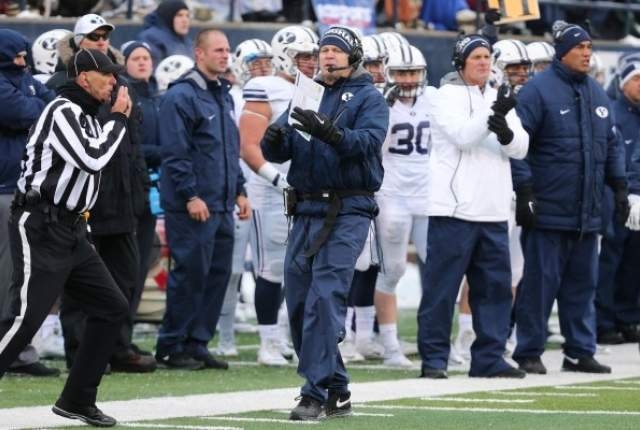 Brigham Young Cougars head coach Bronco Mendenhall calls time-out during the third quarter against the Utah State Aggies at Romney Stadium. (Reuters/Chris Nicoll/USA TODAY Sports)