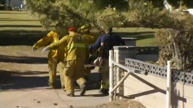 A still image from a video footage courtesy of Nbcla.com shows first responders transporting an injured person at a shooting at the California Department of Developmental Services Inland Regional  ...