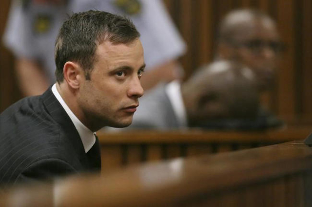 South African Olympic and Paralympic track star Oscar Pistorius listens to the verdict in his trial at the high court in Pretoria September 12, 2014. (Siphiwe Sibeko/Reuters)